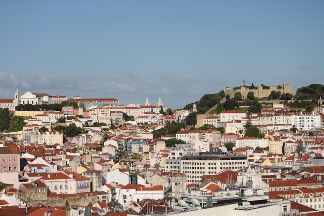 Lisbon Essential Walking Tour: History, Stories and Lifestyle - Praça da Figueira and the Tram Ride Up to Portas do Sol