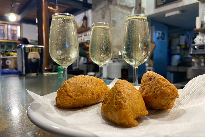 Lisbon Foodies Small-Group Walking Tour - Praca Dom Pedro IV adds history while the food starts arriving