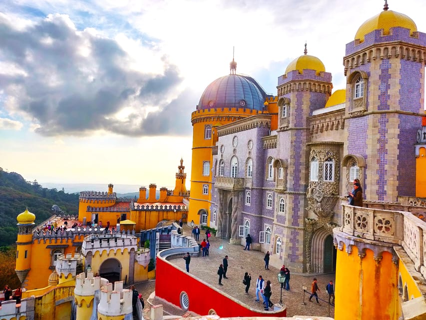 Lisbon: Half-Day Sintra Tour with Pena Palace and Regaleira - Pena Palace terraces: where the views and the colors do the talking