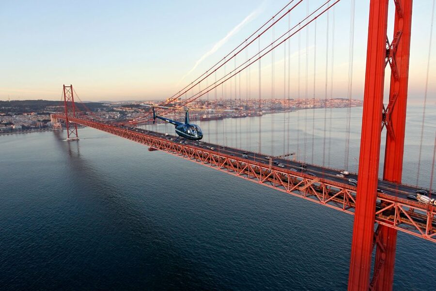 Lisbon: Helicopter Ride, Boat Trip, & Old Town Walking Tour - Helicopter from Belém toward 25th of April Bridge: short flight, big payoff