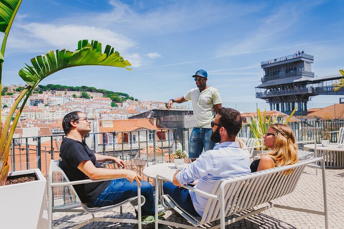 Lisbon Hidden Gems Walk: Traditions, Lunch and Ferry ride - Carmo Convent Beer Stop and the Santa Justa View