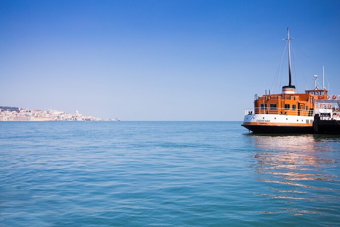 Lisbon Hidden Gems Walk: Traditions, Lunch and Ferry ride - Ferry Ride to Cacilhas and Seafood Rice with Green Wine