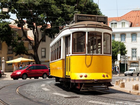 Lisbon Hills Red Tram by Tram 28 route - Multicultural squares, shops, and monuments you pass through