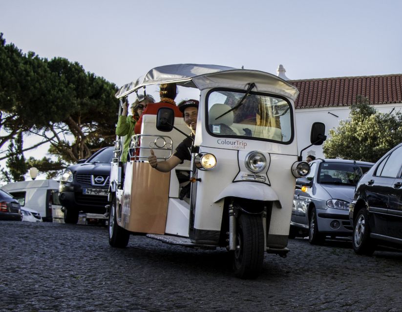 Lisbon: Panoramic Historical Sightseeing Tour by Tuk Tuk - Getting Oriented in Lisbon: Hard Rock Cafe Meet Point, Then Up the Hills