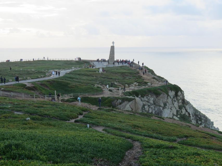 Lisbon: Pena, Regaleira & Atlantic Coast Tour with a Local - Quinta da Regaleira: Initiation Well, Secret Passages, and Symbol Clarity