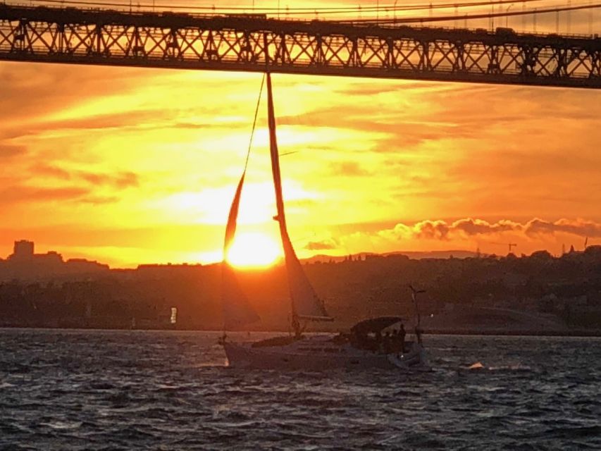 Lisbon: Private Sunset Sailing Tour with Champagne - Meeting at Belém dock near Hotel Altis, then out past the famous monuments