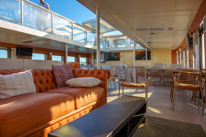 Lisbon River Boat Sightseeing Tour with a Drink - 25 de Abril Bridge: the orange landmark with a San Francisco connection