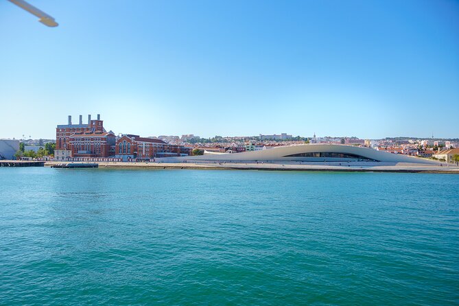 Lisbon River Boat Sightseeing Tour with a Drink - Monument to the Discoveries and Jerónimos-area styles you can spot from the river