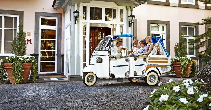 Lisbon's historic old town in a tuk-tuk in German - Alfama and Mouraria: The Narrow Streets Where Lisbon Still Feels Local