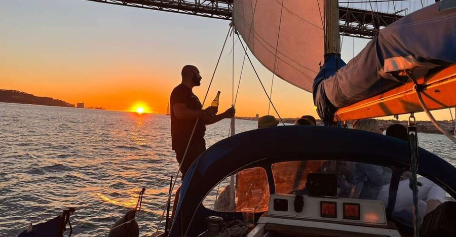Lisbon: Sailboat Sunset Tour with a Drink - Commerce Square to Almada: the Lisbon skyline from the river’s eye level