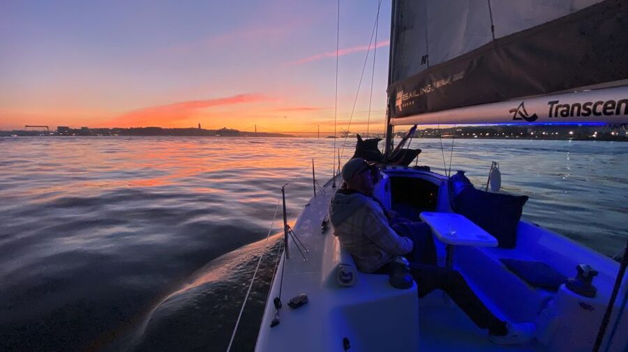 Lisbon: Sailboat Tour w/ Local Guide and Open Bar Green Wine - Entering The Tour: From the 25 de Abril Bridge to the Tagus