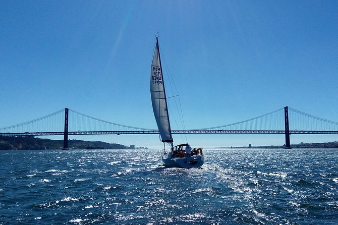 Lisbon Sailing Tour on a Luxury Sailing Yacht with 2 Drinks - Price and value: $46.26 for drinks, food, and a full sightseeing loop