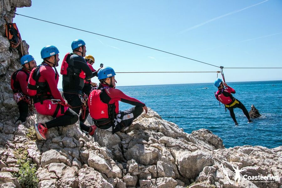 Lisbon: Sesimbra/Arrábida Natural Park Coasteering Adventure - Entering the Arrábida coast from Sesimbra