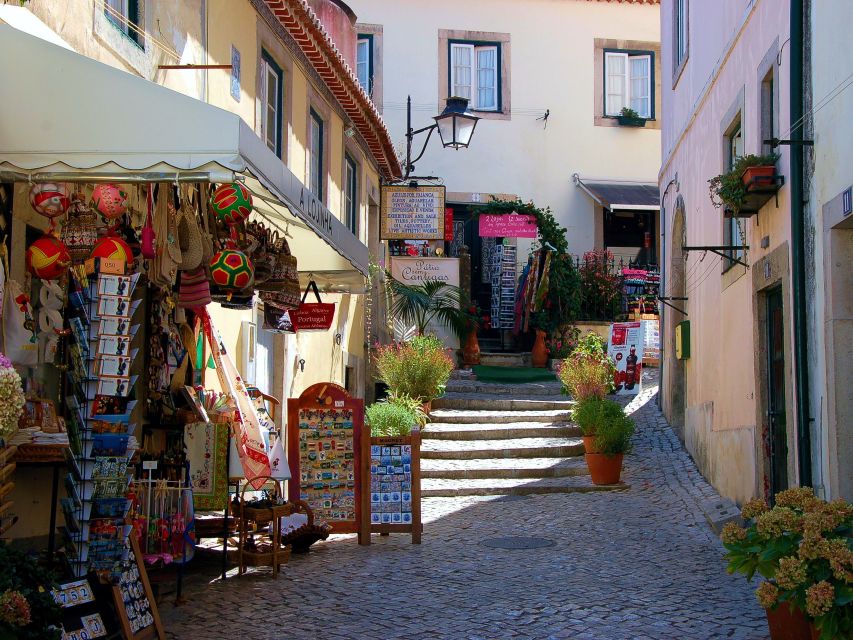 Lisbon: Sintra, Pena Palace, Quinta Regaleira, Cascais Tour - Sintra Palace photo stop: useful framing without stealing your day