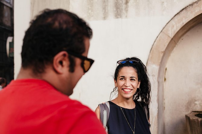 Lisbon Small-Group Food Tour with 18 Tastings in Alfama District - Largo Portas do Sol: Where the Tour Sets the Pace