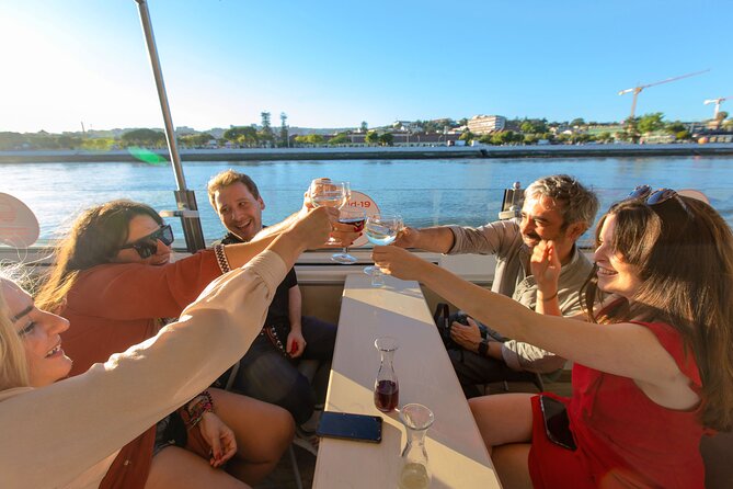 Lisbon Sunset cruise with Welcome Drink and Snack included - Passing Ponte 25 de Abril: The Bridge That Eats the Horizon