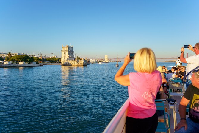 Lisbon Sunset Cruise with Wine and Snacks - Audio Guide vs. Live Guidance, and How It Affects Your Enjoyment