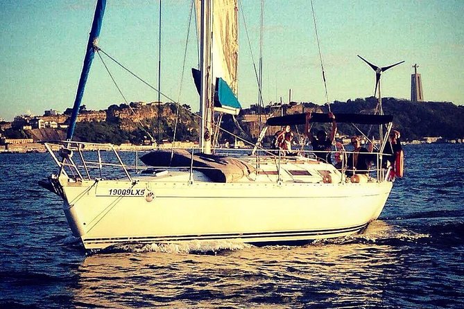 Lisbon Sunset Sailing Tour with White or Rosé Wine and Snacks - The meeting dock, what the 2-hour rhythm looks like
