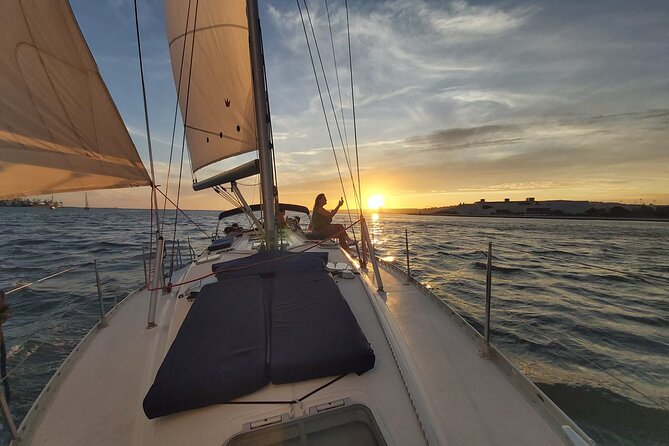 Lisbon Sunset Sailing with Portuguese Wine and History - The Tagus Story Begins: 25th April Bridge and Almada Views
