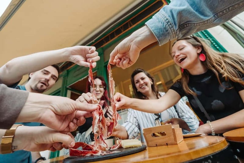 Lisbon: Tastes and Traditions Guided Food Tour - Iberian ham, canned fish, and the “no-frills” Lisbon palate