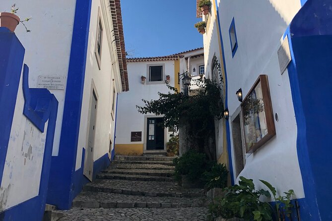 Lisbon to Fatima/Batalha/Nazare & Obidos guided tour 8pax group - Óbidos: Medieval Streets, a Sweet Finale, and Ginja in Chocolate