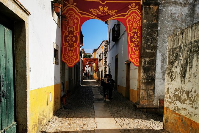 Lisbon to Porto Up To 5 Stops Óbidos Nazaré Fátima Coimbra Aveiro - Fátima: Basilica Visits and When Mass Helps Your Experience
