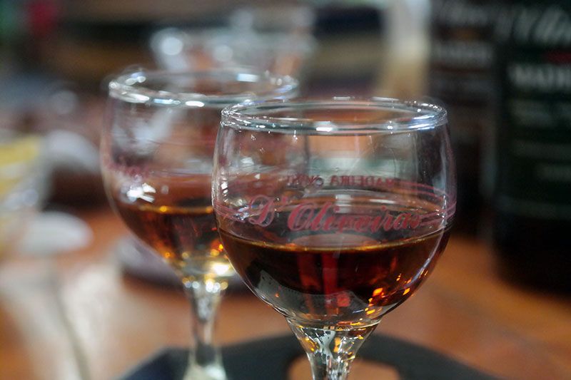 Madeira: Food and Wine Walking Tour in Funchal - Stop 1: Madeira wine tasting, Sercial and Malmsey, plus the island story