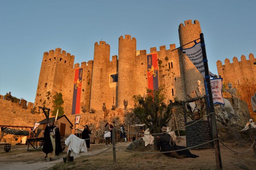 Óbidos: Medieval Tales & Secrets Spots Guided Walking Tour - Inside the castle of Óbidos, reading 1300 years of Moorish origin
