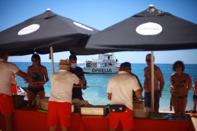 Ophelia Catamaran Cruises + Beach BBQ - Benagil Caves by Smaller Boats: Getting Close Without a Charter
