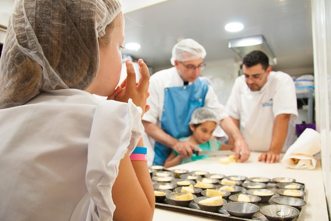 Pastel de Nata Masterclass at a Real Bakery in Downtown Lisbon - Custard filling and baking in a professional oven