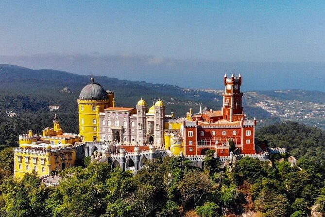Pena Palace & Sintra Full Day -Private Tour in Classic Car - Historic Sintra center: lunch, alley walks, and palace sweets