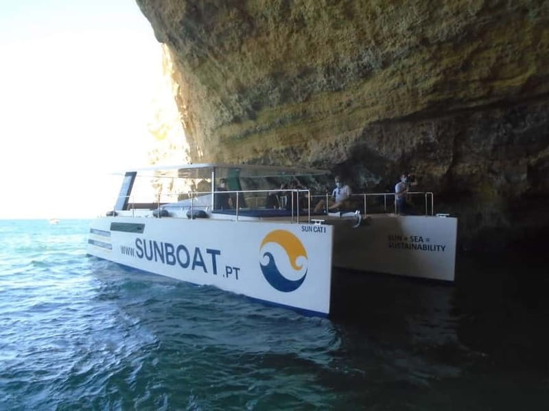 Portimão: Benagil Caves & Golden Coast Eco Catamaran Tour - Comfort on the eco catamaran: shade, bar, deck, and a restroom