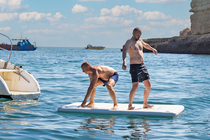 Portimao: Brunch and Benagil Caves - Swim Stop, Paddle Boarding, and the Inflatable Waterpark
