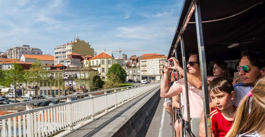 Porto: City Train Tour, River Cruise & Wine Cellar - Ribeira Pier Douro Cruise: Bridges, Fresh Air, and No Audio