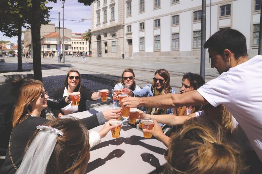 Porto: Evening Local Food Crawl with Drink Pairings - Stop one: aperitif and Portuguese spirits to set the tone