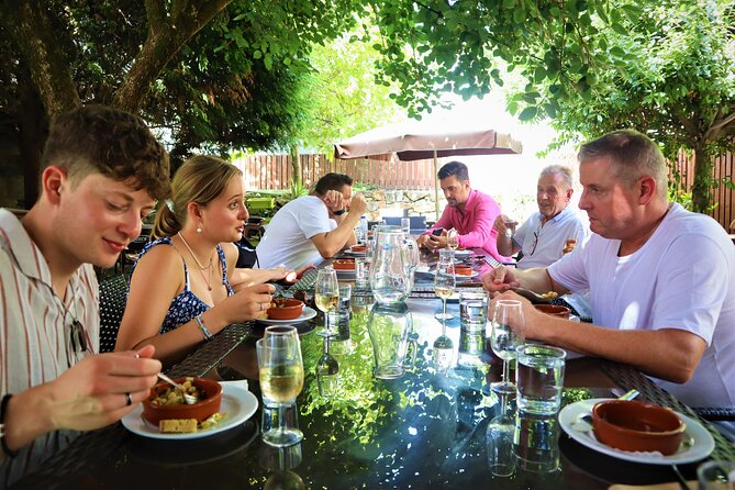 Porto Food and Wine Tasting Tour of Hidden Gems (Small Groups) - Avenida dos Aliados: bifana plus crisp Portuguese beer
