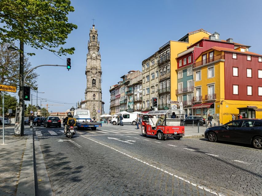 Porto: Guided Tour by Tuk-Tuk & Optional Douro River Cruise - Aliados Avenue and Lello Bookshop area: seeing the famous boulevard from the right angle