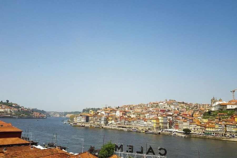 Porto: Guided Walking Tour and Lello Bookshop - Churches, Bolhão area energy, and the Douro rabelo boat connection