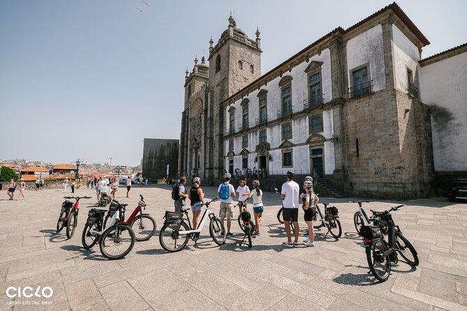 Porto Highlights in 3 Hours E-Bike Tour - Historical, Sightseeing - Inside Porto’s landmarks: Porto Cathedral and Sao Bento’s azuleijos