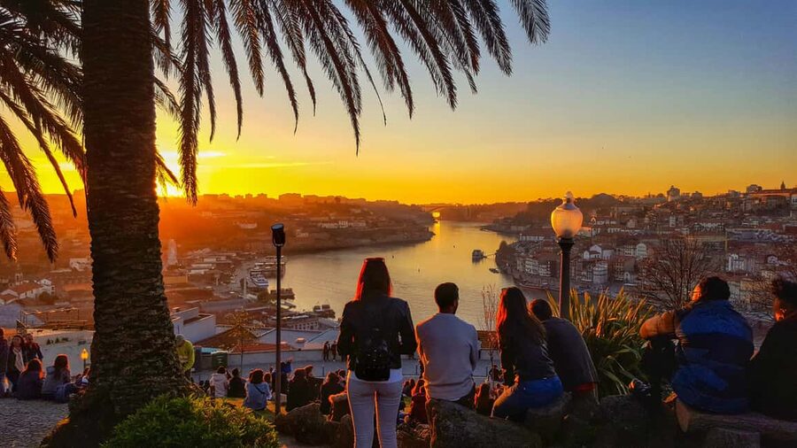 Porto: Private Sunset Walking Tour with Port Wine and Views - Crossing the Luis I Bridge toward the best river angles