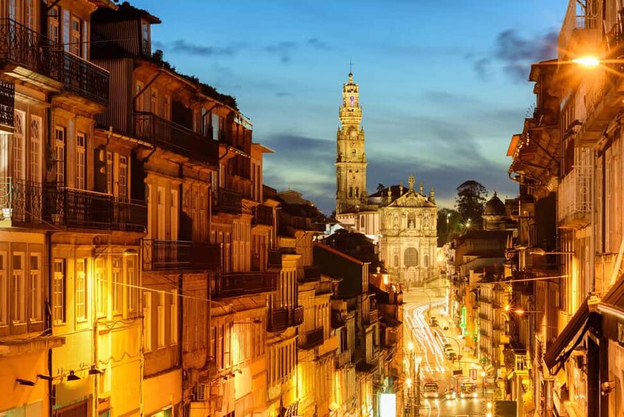 Porto: Private Sunset Walking Tour with Port Wine and Views - São Bento tiles, Aliados Avenue, and the Carmo and Carmelitas Church detail that sticks