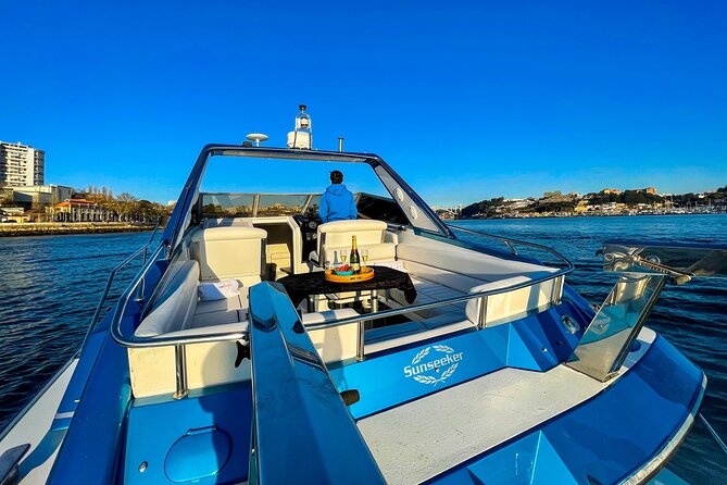 Porto: Private Yacht Cruise with Local Wine, Snacks and 6 Bridges - Local wine, snacks, and comfort details that make the cruise easy