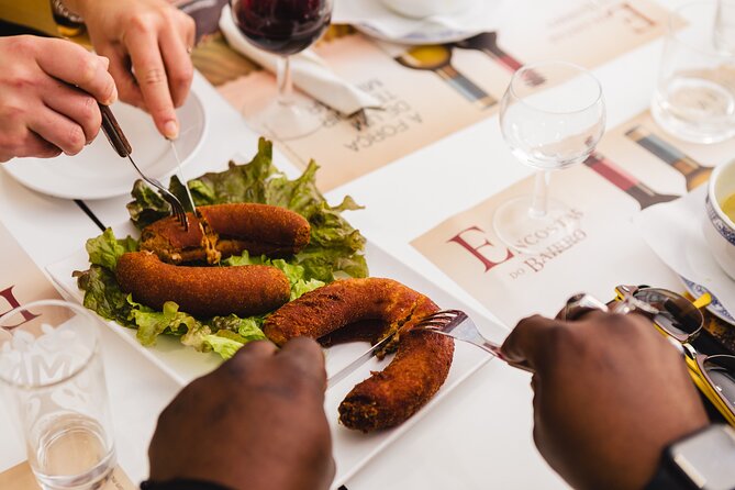 Porto Wine & Dine: Port Wine Cave Food Tour with Eating Europe - Alheira on Rua Luís de Camões, plus that local history lesson