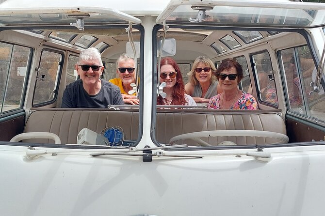 Private Porto Sightseeing by Vintage VW Kombi (up to 8 people) - Clérigos Tower from outside: iconic, quick, and photo friendly