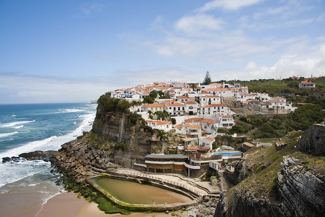 Private Tour Sintra, Pena Palace and Cascais from Lisbon - Quinta da Regaleira: Initiation Well, Caves, and Gardens That Feel Like a Puzzle