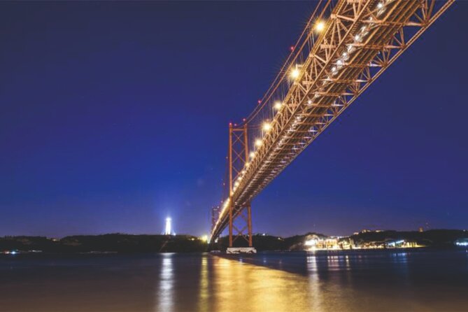 Sail & Dine Sailboat Tour With Sunset - 25th of April Bridge and King’s Christ as night approaches