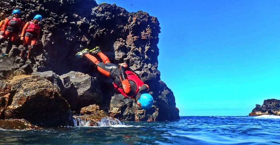 São Miguel: Coasteering Experience in Caloura - Your 3-hour flow: pickup, van ride, kit up, and first steps