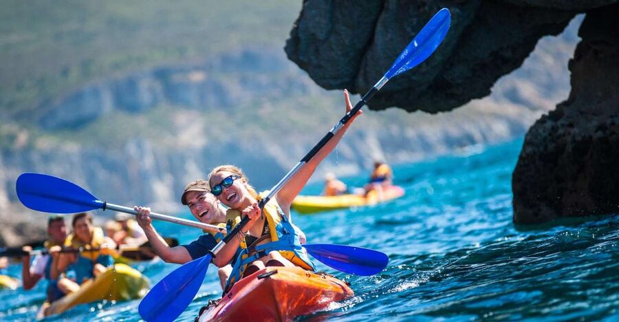 Sesimbra: Arrábida Natural Park Guided Kayaking Tour - Sesimbra and the Arrábida coast, seen from the water
