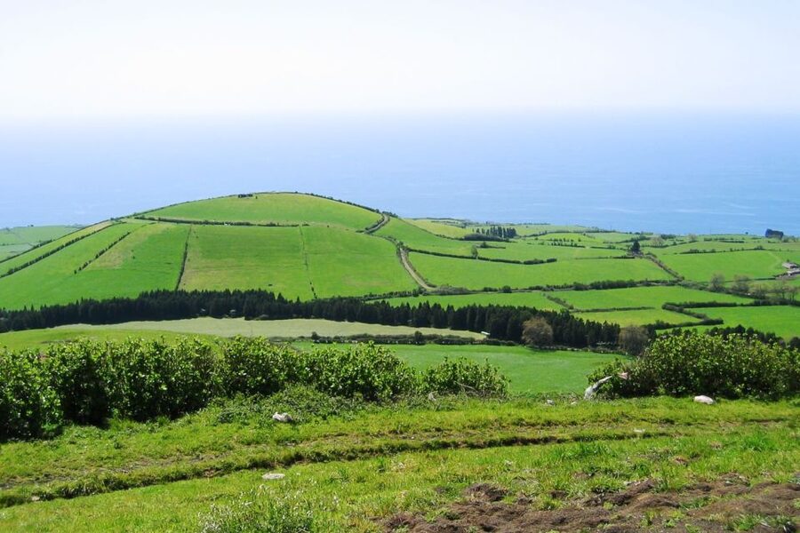 Sete Cidades Azores 4x4 Day Tour from Ponta Delgada - Mosteiros black basalt beach, natural pools, and harbor atmosphere