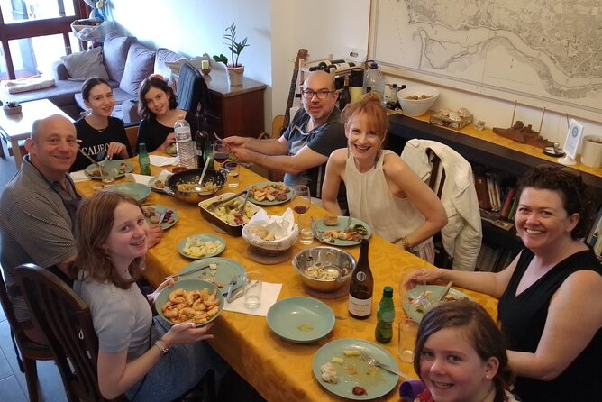 Shopping, cooking and eating together at my home in Porto - What You’ll Cook: Clams, Codfish, Pork, Seafood Rice, and Custard